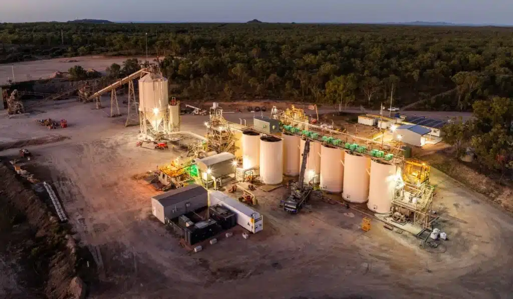 Aerial view of a remote mining and processing facility at dusk, featuring Durotank self bunded fuel tanks, processing infrastructure and operational equipment surrounded by Australian bushland.