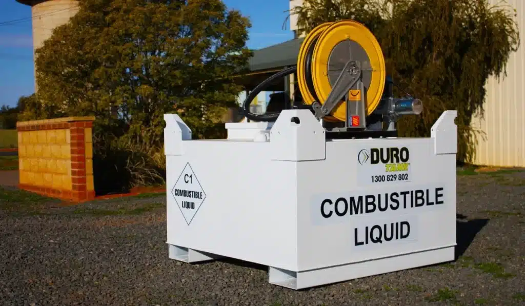 Durotank portable diesel fuel cube with integrated hose reel and dispensing system, designed for secure fuel storage and controlled fuel access on worksites and rural properties.