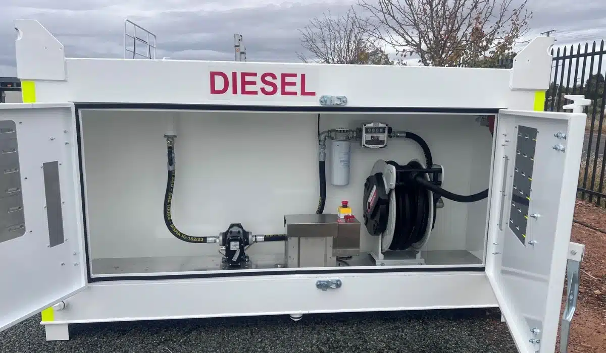 Internal compartment of a Durotank self-bunded diesel fuel tank showing the integrated fuel transfer pump, filtration system, flow meter, retractable hose reel and secure lockable cabinet.