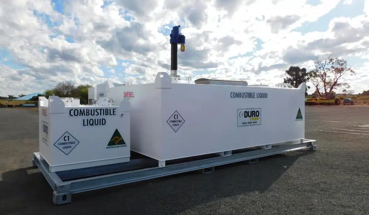 Angled view of a Durotank self-bunded diesel storage tank and portable fuel cube on a galvanised skid base, providing compliant fuel storage for remote industrial applications.